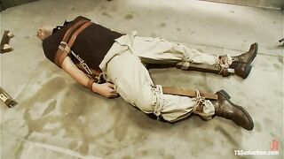 Chubby white shemale have fun with a guy in bondage